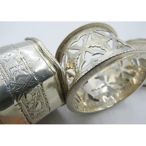 341 - A silver caddy spoon, Sheffield 1920, and three silver napkin rings, Birmingham 1891, Chester 1911. ... 