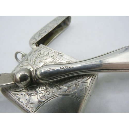 342 - A silver vesta case engraved with foliate design, plain cartouche, Chester 1912 and a silver handled... 