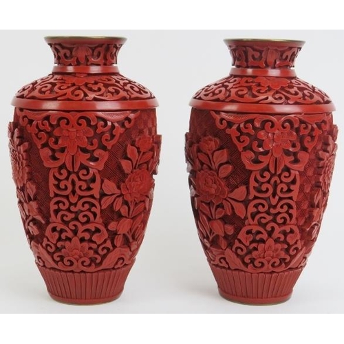 36 - A pair of Chinese cinnabar lacquer vases. (2 items) 6 in (15.3 cm) diameter. 
Condition report: Good... 