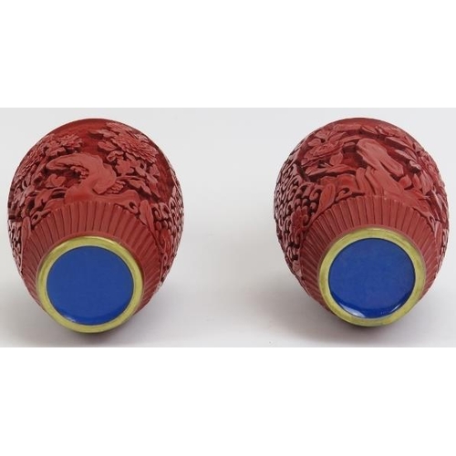 36 - A pair of Chinese cinnabar lacquer vases. (2 items) 6 in (15.3 cm) diameter. 
Condition report: Good... 