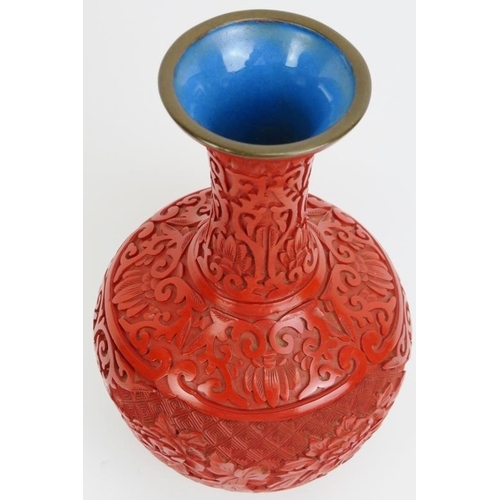 38 - A Chinese cinnabar lacquer vase. 8.2 in (20.8 cm) height. Condition report: Good condition.