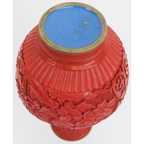 38 - A Chinese cinnabar lacquer vase. 8.2 in (20.8 cm) height. Condition report: Good condition.