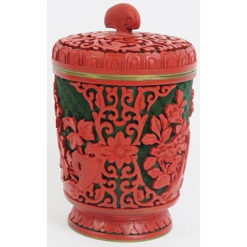 39 - A Chinese green and cinnabar lacquer jar and cover. Modelled with a lingzhu fungus finial. 5.1 in (1... 