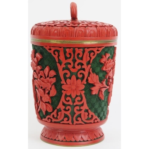 39 - A Chinese green and cinnabar lacquer jar and cover. Modelled with a lingzhu fungus finial. 5.1 in (1... 