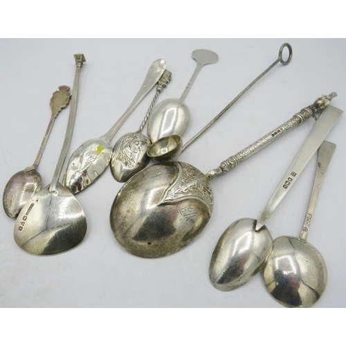 391 - A collection of various spoons, to include a Victorian anointing spoon, London 1897, a skimming spoo... 