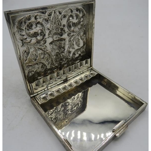 442 - A Siamese white metal Siam Square cigarette box, embossed with figures & scrolls. Approx 3 1/2