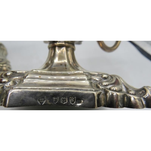 449 - A pair of Victorian double branch silver candelabrum, with square bases and embossed decoration, Lon... 