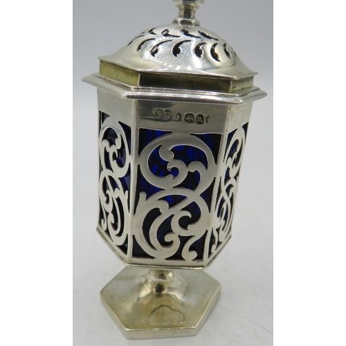 469 - A Georgian silver pedestal pepper pot with pierced decoration and blue liner, London 1836. Silver we... 