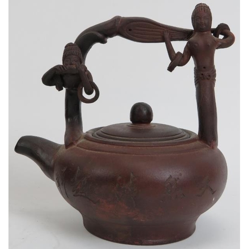 49 - A group of three Chinese Yixing pottery teapots. (3 items) 5.6 in (14.2 cm) tallest height. 
Conditi... 