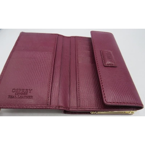 500 - Osprey, London, leather maroon wallet/purse, boxed.
Provenance: Part of a private collection of desi... 