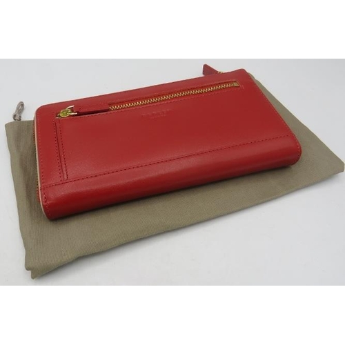 500A - Radley, London, red wallet.
Provenance: Part of a private collection of designer luxury goods bought... 