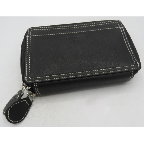 500B - An Osprey, London, black wallet.
Provenance: Part of a private collection of designer luxury goods b... 