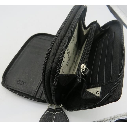 500B - An Osprey, London, black wallet.
Provenance: Part of a private collection of designer luxury goods b... 