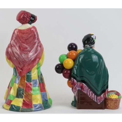 71 - Two Royal Doulton figurines, 20th century. Comprising The Balloon Seller, HN 1315 and The Parson’s D... 