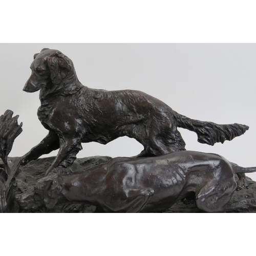 75 - After Pierre Jules Mene: A French cast bronze pair of hunting dogs, 20th century. Modelled in a natu... 