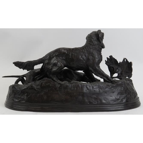 75 - After Pierre Jules Mene: A French cast bronze pair of hunting dogs, 20th century. Modelled in a natu... 