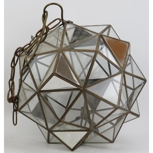 81 - A large multifaceted glass polyhedron ceiling light, 20th century. Composed of clear and mirrored tr... 