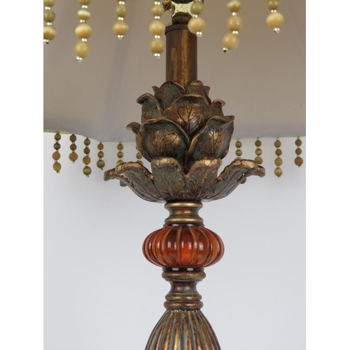 82 - A modern European bronzed metal and glass buffet table lamp. Decorated with an artichoke above a kno... 