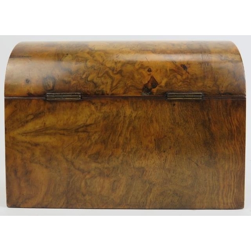 94 - A walnut burr tea caddy, 19th century. Of rectangular form with a domed cover. 8.9 in (22.8 cm) widt... 