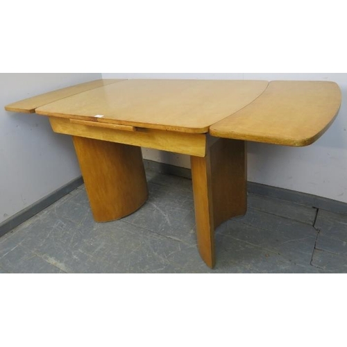 708 - An Art Deco Period bird’s eye maple draw-leaf extending dining table, on curved supports. 
H77cm W10... 