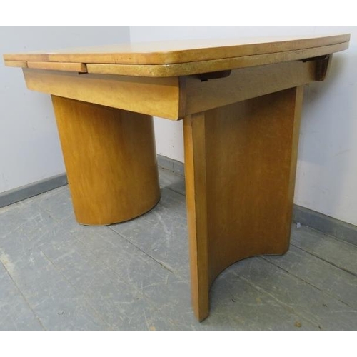 708 - An Art Deco Period bird’s eye maple draw-leaf extending dining table, on curved supports. 
H77cm W10... 