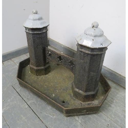 711 - A very large 19th century cast iron boot scraper, the two octagonal columns with ball finials, unite... 