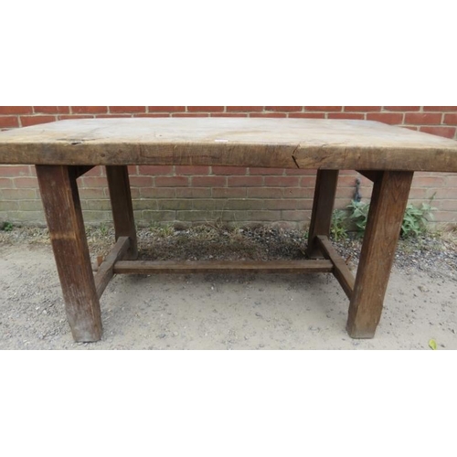 712 - A substantial 19th century elm kitchen/pantry table on chamfered square end supports with stretchers... 