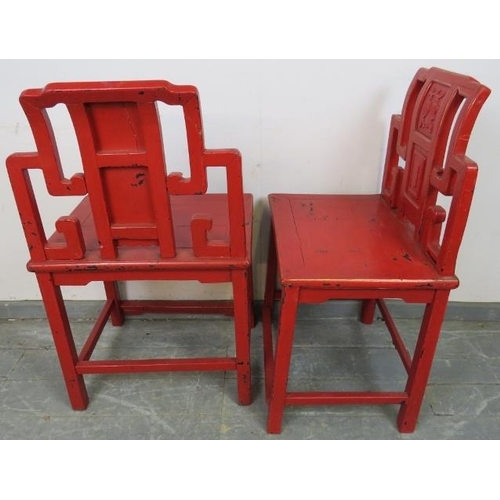 721 - Four early 20th century Chinese chairs in cinnabar red lacquer with gold accents, on square supports... 