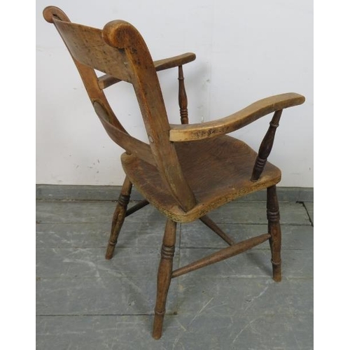 727 - A 19th century elm and beech ‘Oxford’ elbow chair, on canted turned supports with an ‘H’ stretcher. ... 