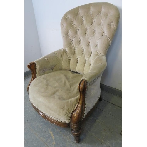 728 - A Victorian walnut armchair upholstered in buttoned grey velvet material, on tapering supports. 
H98... 