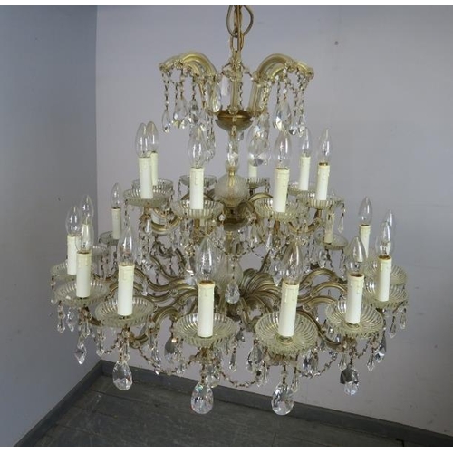 729 - A large vintage 24 branch crystal chandelier. Total drop approx 95cm.
Condition report: Some droplet... 