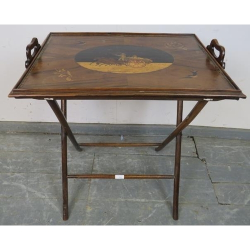 736 - A Georgian walnut marquetry inlaid butler’s tray on stand, one side depicting a hay wagon and horses... 