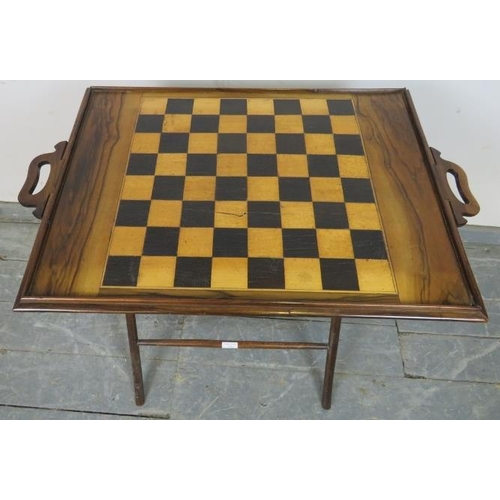 736 - A Georgian walnut marquetry inlaid butler’s tray on stand, one side depicting a hay wagon and horses... 