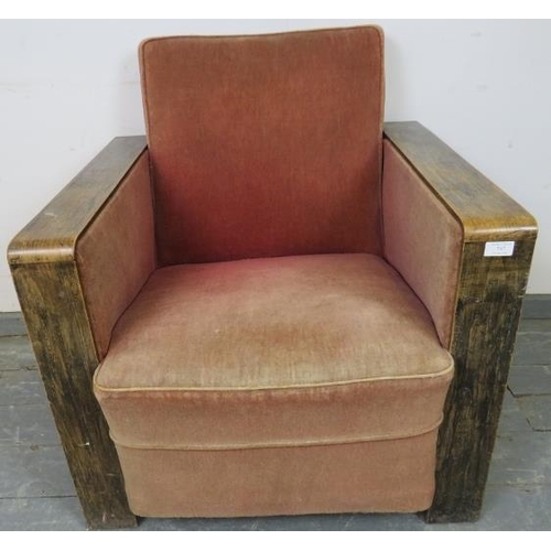 747 - An Art Deco Period oak show-wood armchair, upholstered in faded red velvet material, on block feet. ... 