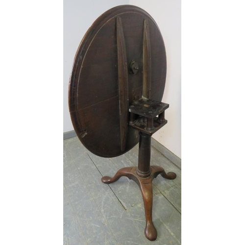 748 - A 19th century mahogany circular tilt-top ‘birdcage’ table, on a plain tapering column and splayed t... 