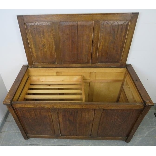 835 - A 19th century oak coffer, with fielded panels to front and sides, with lift-out internal tray, on s... 