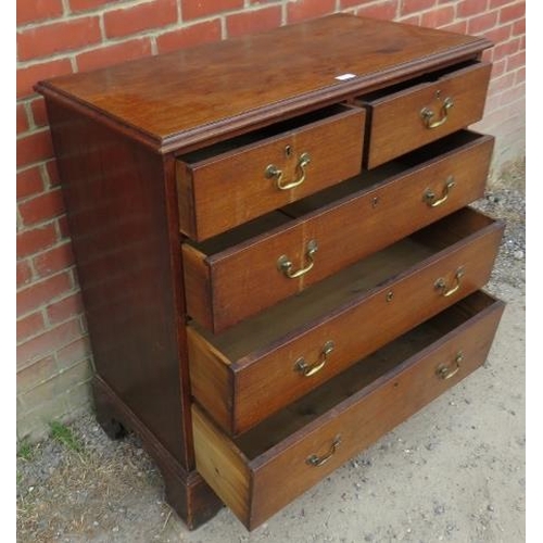 844 - A Georgian mahogany straight-front chest of two short over three long graduated drawers with brass s... 