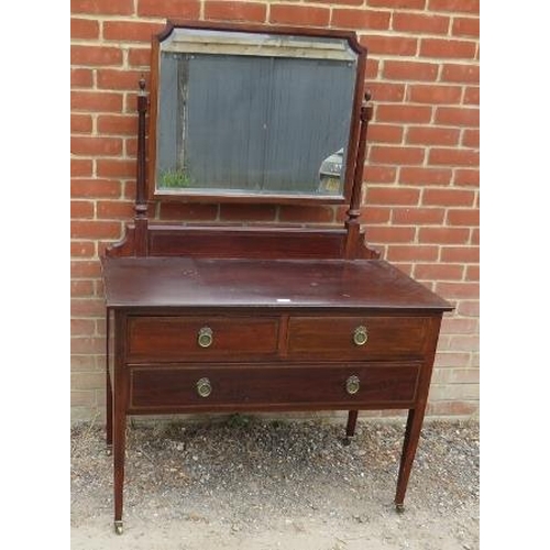 849 - A good quality Edwardian Regency Revival mahogany dressing table, inlaid with walnut and ebony, the ... 