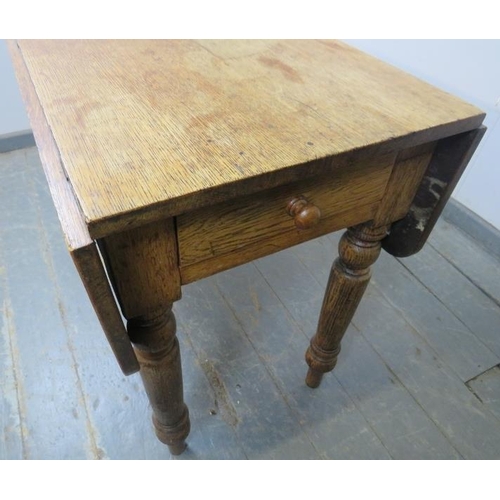 851 - A 19th century medium oak Pembroke table with single drawer, on tapering turned supports. 
H74cm W74... 