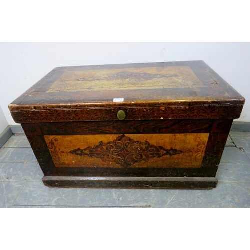 864 - An antique pine flat top trunk, painted in the Continental style, the internal candle box with two s... 