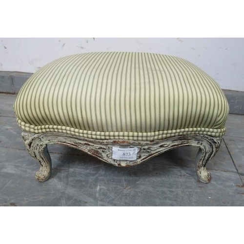 873 - A small Victorian footstool, upholstered in period style striped material, the carved base painted d... 