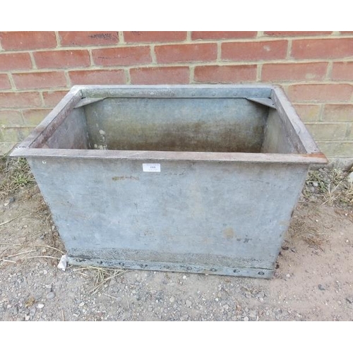 888 - A vintage galvanized steel trough planter banded and riveted, with braced corners. 
H41cm W66cm D44c... 