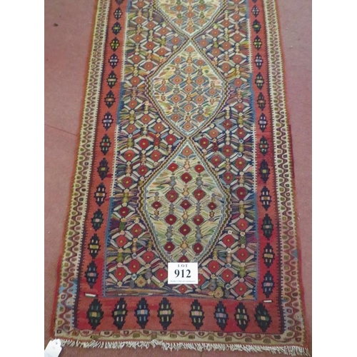 912 - A good North West Persian Senneh Kilim runner, 7 central panels on a patterned ground and in good co... 