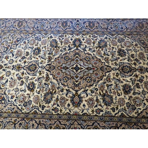 921 - A Persian Yazd carpet. Yazd formerly known as Yezd (Iran) 270 km South East of Isfahan. Central moti... 