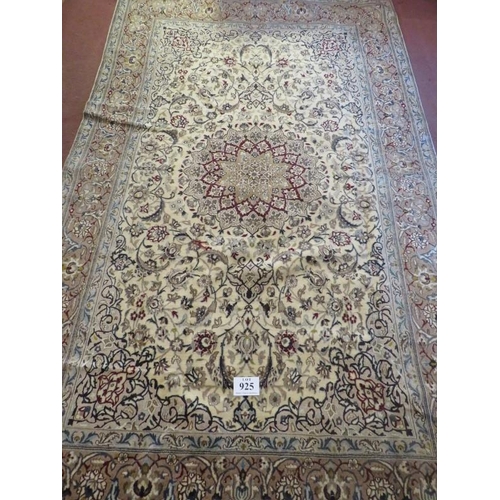 925 - A Fine Persian Naim carpet, a central spirograph pattern on good ground with heavy foliage design. 3... 