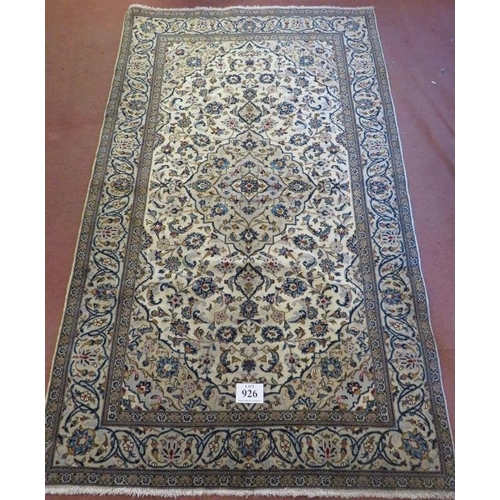 926 - A Persian Ardkan carpet, central motif on cream ground with pale blue and dawn foliage. 248 x 150.