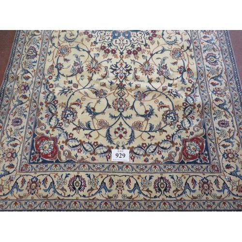 929 - A fine Persian Nain carpet, central motif on cream ground with foliage design. In good condition. 26... 