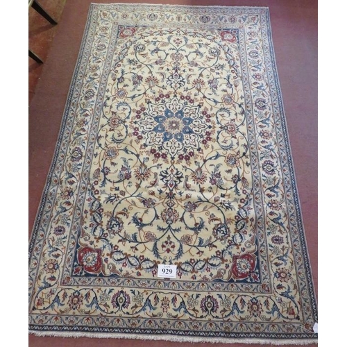 929 - A fine Persian Nain carpet, central motif on cream ground with foliage design. In good condition. 26... 