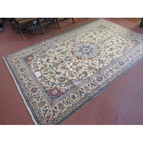 929 - A fine Persian Nain carpet, central motif on cream ground with foliage design. In good condition. 26... 