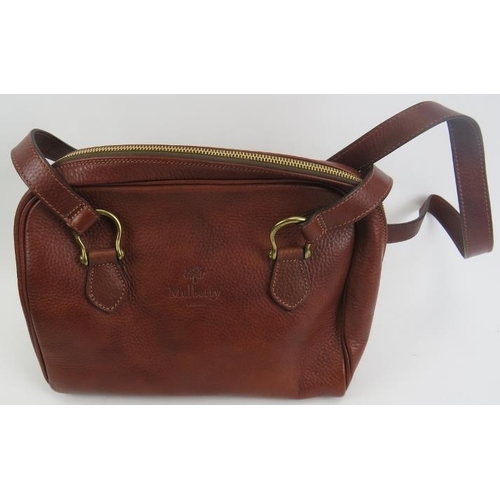 489 - A Mulberry tan leather handbag with original Mulberry plaid lining.
Provenance: Part of a private co... 